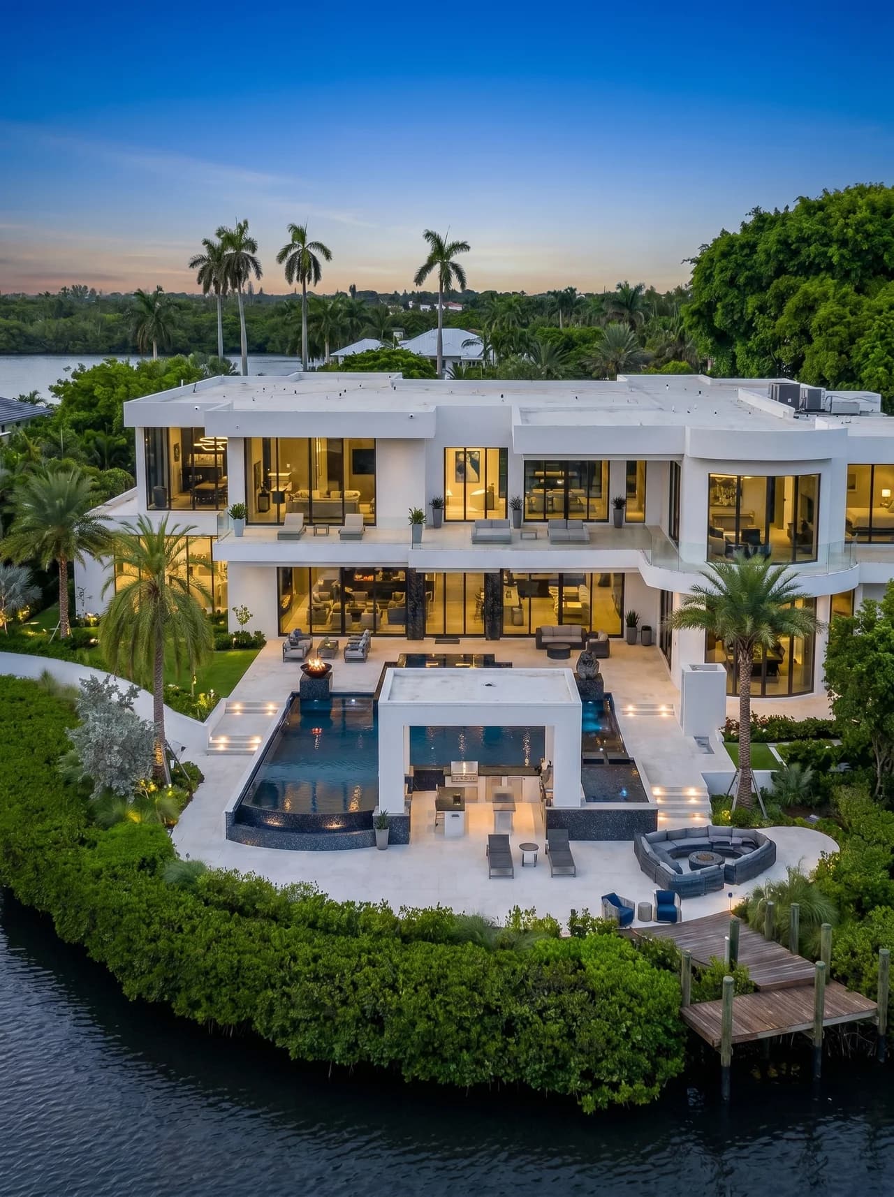 A modern waterfront Central Florida estate at dusk